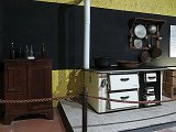 054-cucina con mobili e attrezzi di lavoro.jpg